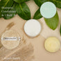 Shampoo, conditioner, and body bar with green leaves on a beige background