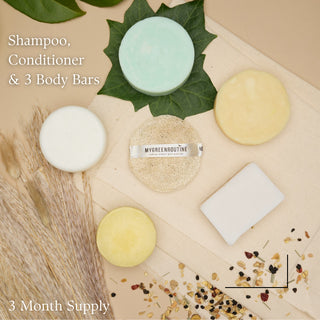 Set of shampoo, conditioner, and body bars with 'My Green Routine' packaging on a natural background.