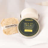 Solid Silk conditioning bar with packaging on a light background