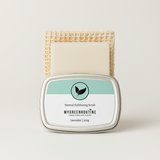 Natural and organic lavender body bars with essential oils stacked with convenient travel tin and exfoliator