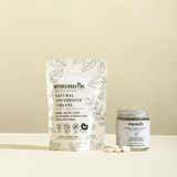 MyGreenRoutine natural toothpaste tablets packaging and jar on a beige background