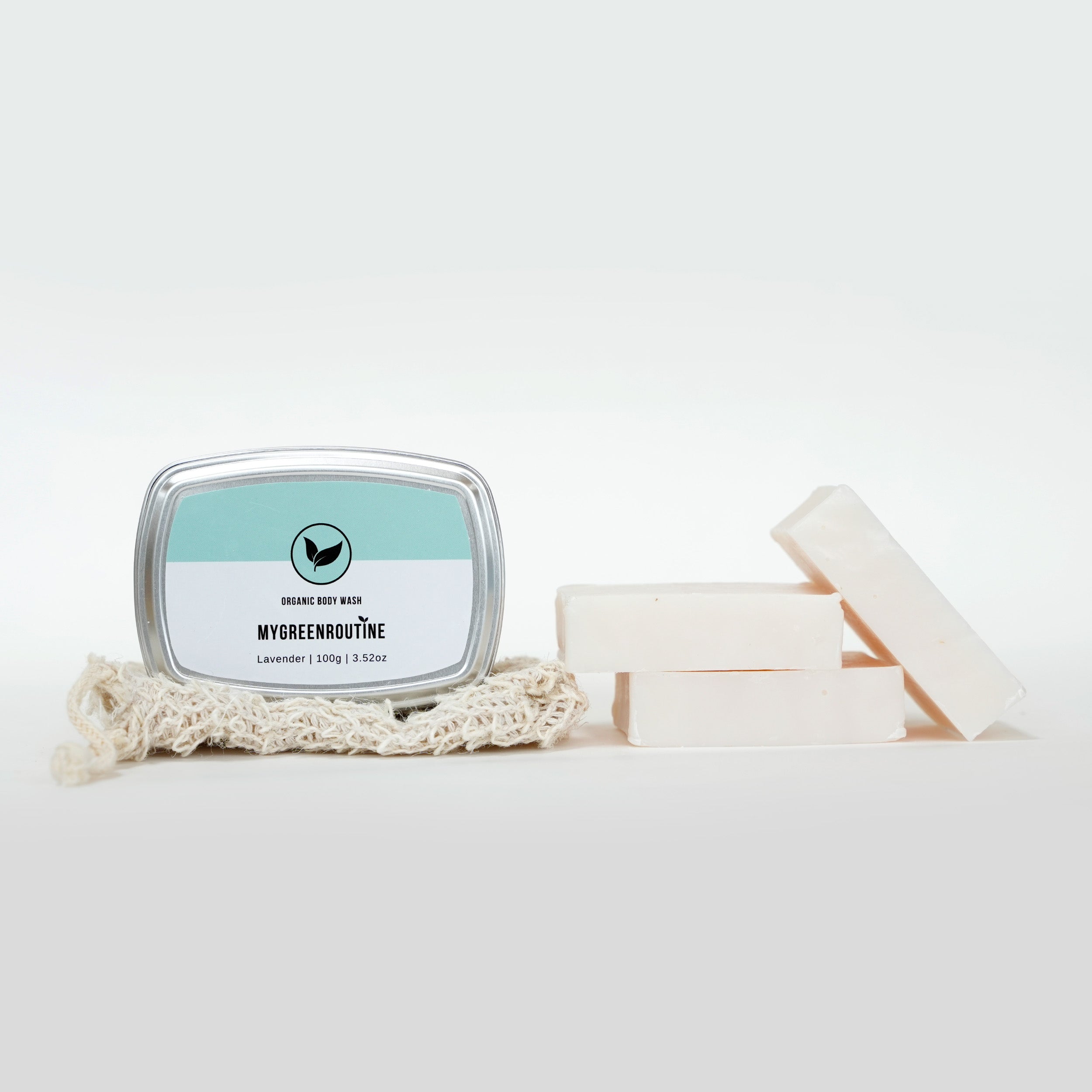 Natural and organic lavender body bars with essential oils stacked with convenient travel tin and exfoliator