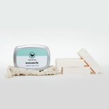 Natural and organic lavender body bars with essential oils stacked with convenient travel tin and exfoliator