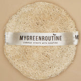 Loofah with 'MyGreenRoutine' label on a beige background