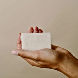 Model holding Lavender SOap Bar in Hand with Natural Foam